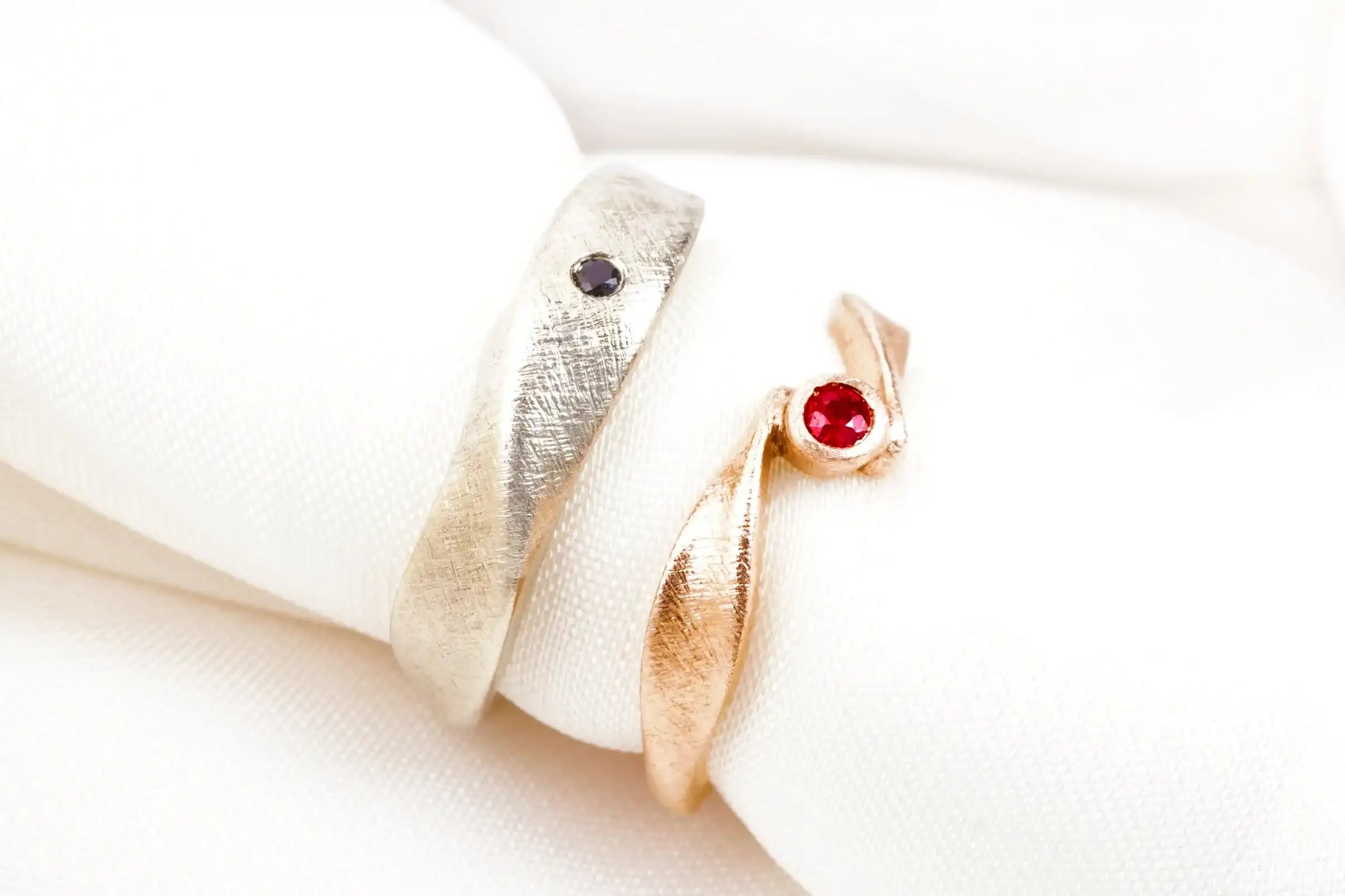 custom_diamond_and_ruby_14k_gold_wedding_ring_leaves.webp